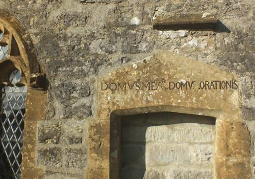 Photo Gallery Image - Close up of inscription on wall of Holy Cross, Weston Bampfylde